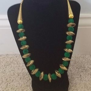 Beautiful bold necklace with fabric balls.